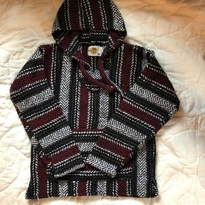JOURNEYS maroon, white, and black Baja poncho